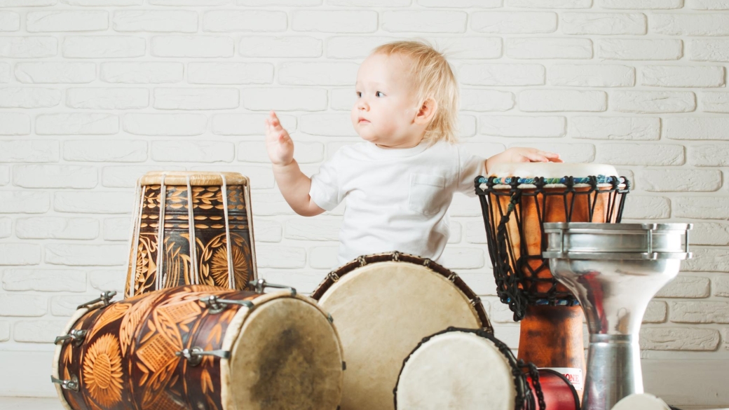 cute-baby-playing-drums_255440-3071